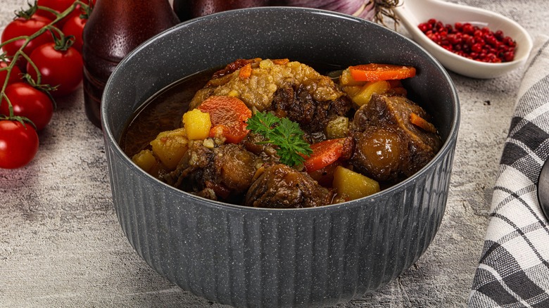 Oxtail soup in a blue bowl
