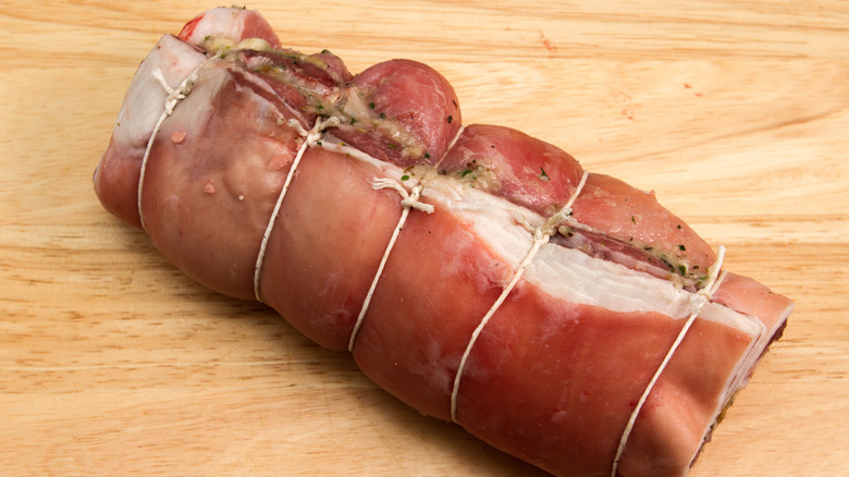 Rolled lamb breast stuffed with seasoning