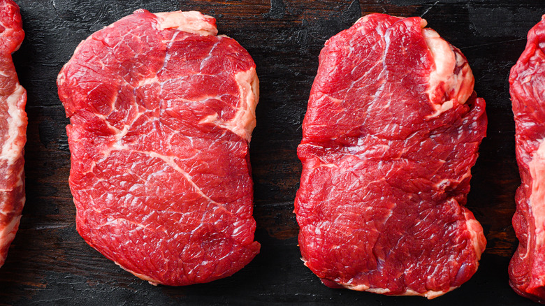 Raw rump steaks