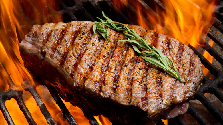 Close-up of steak on the grill
