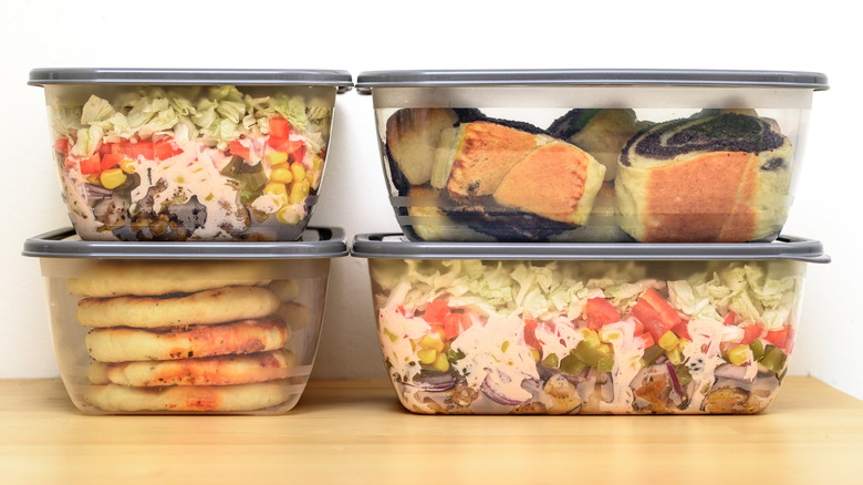 plastic food storage containers stacked together