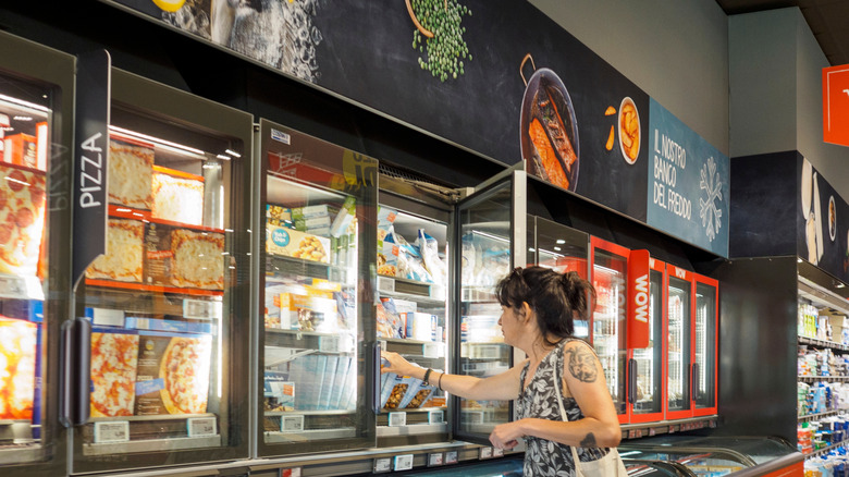 Woman shopping in an Aldi store
