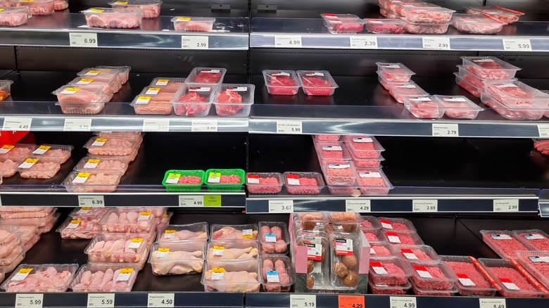 Meats on refrigerated shelves at Aldi