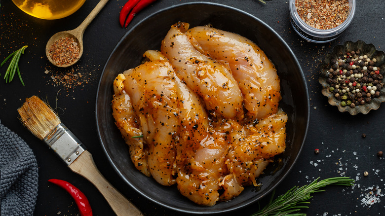 Raw marinated chicken