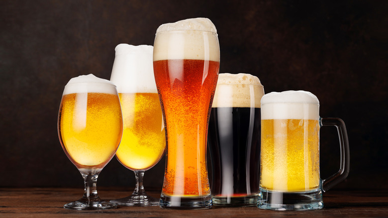 Selection of different types of beer in various glasses