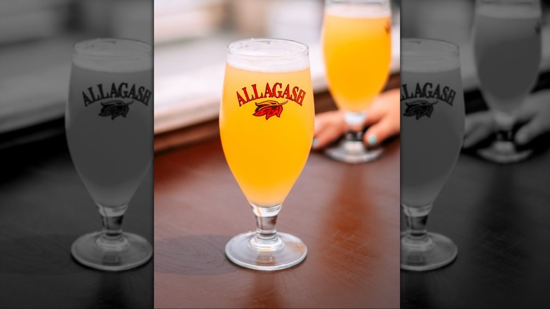Glass of Allagash White with another in the background