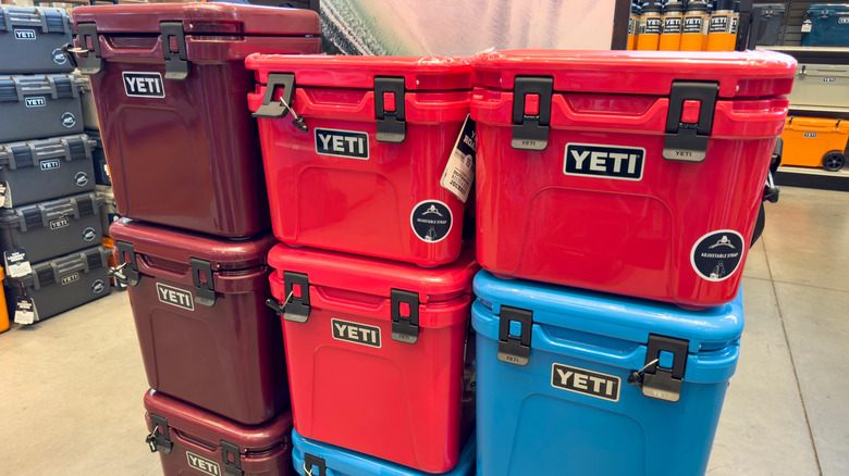 A stack of Yeti coolers in a store.