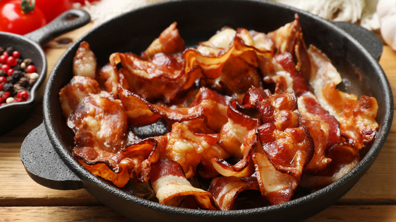 Bacon curling in pan