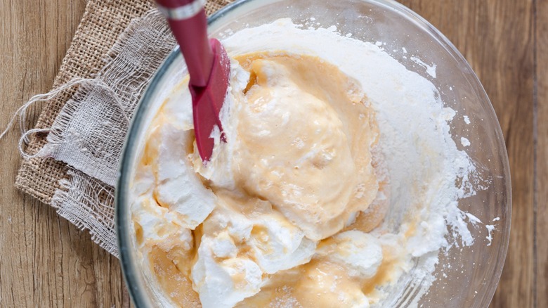 Folding whipped egg whites into batter