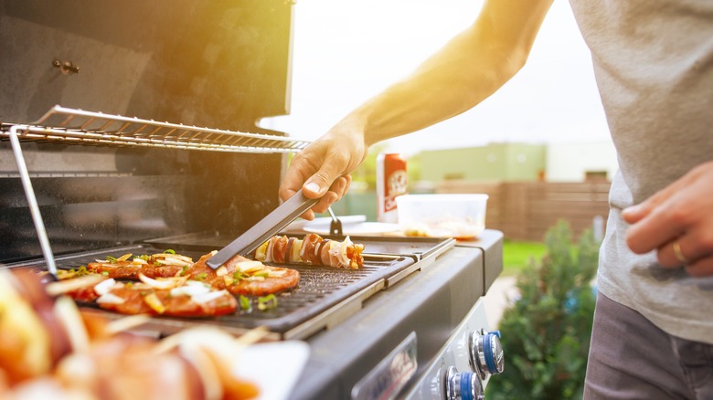 Man cooking at grill