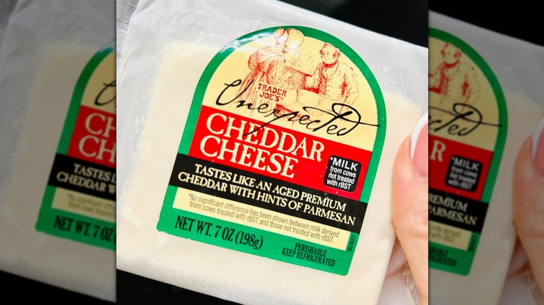 A block of Trader Joe's unexpected cheddar cheese