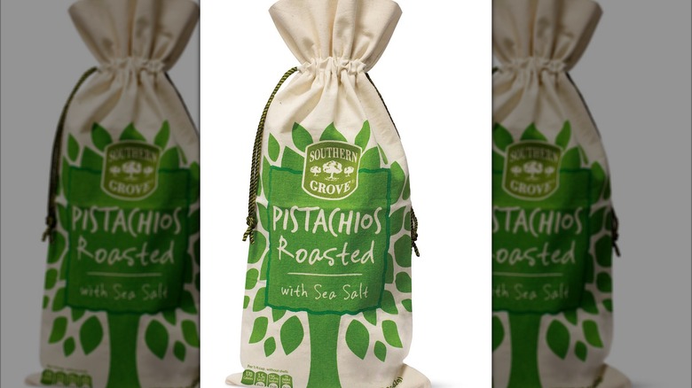Southern Grove Roasted Pistachios wrapped in a rustic burlap drawstring bag