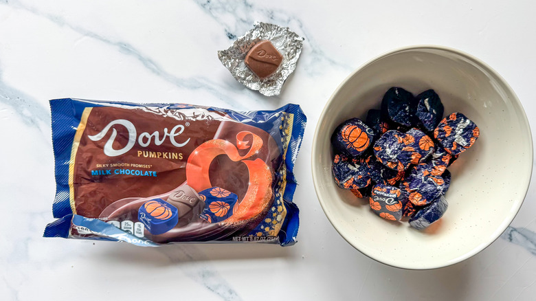 Dove pumpkins on marble surface