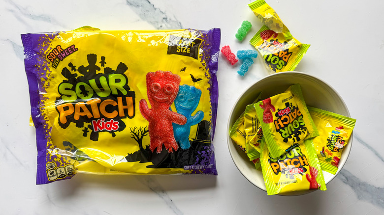 Sour Patch Kids bag on marble surface