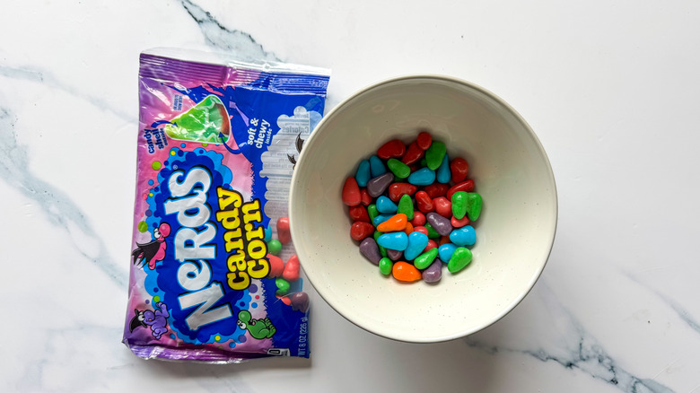 Nerds candy corn on marble surface