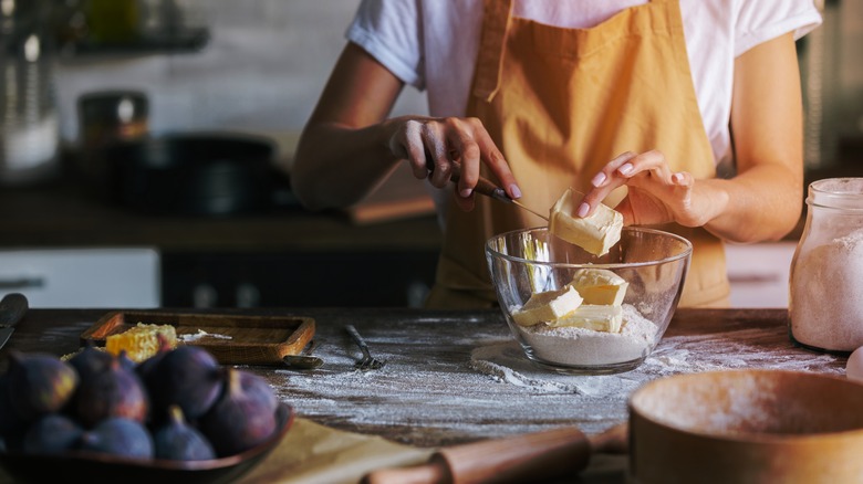 woman baking with margarine