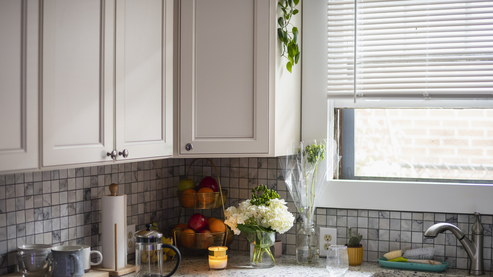 The Best Cabinet Trick To Create The Illusion Of More Space In Your Kitchen
