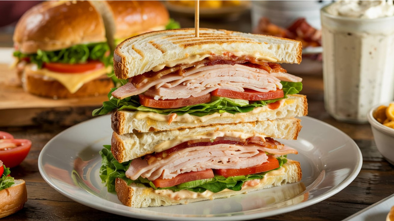 A club sandwich on a plate at a restaurant