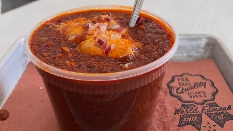 Bowl of chili on tray with Fox Bros. logo