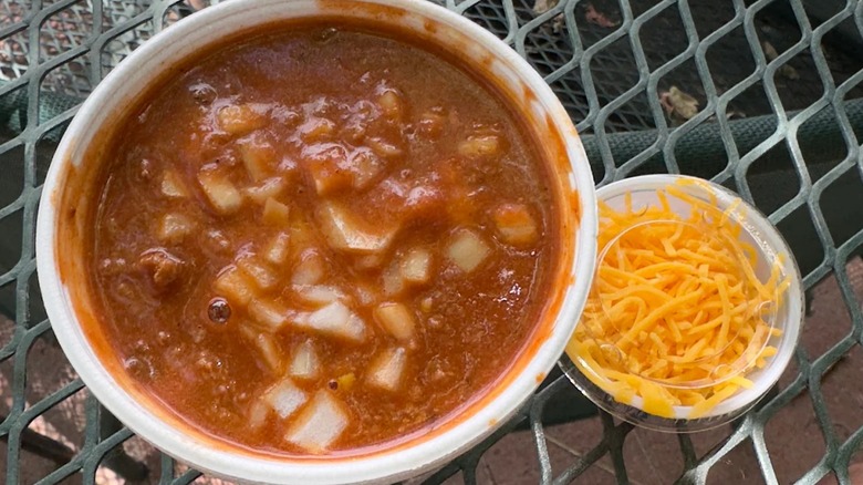 Bowl of chili and side of cheese