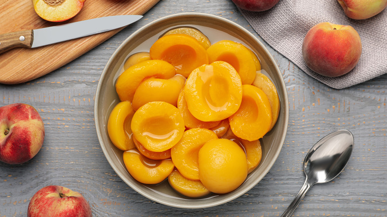 Canned peaches on a plate