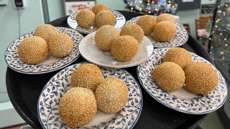 Plates full of sesame seed balls from Hong Kong Spirit Food