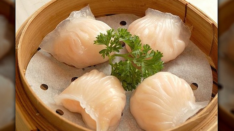 Dim sum from Wonton King in a wooden bowl