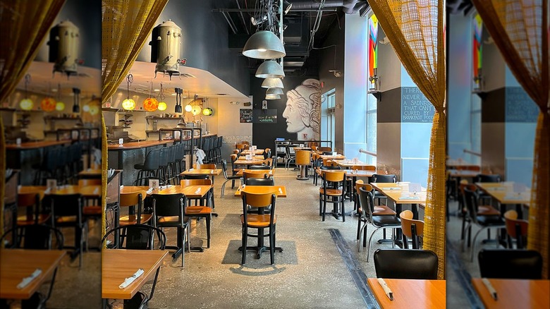 View of the interior of Dime Store, including seating and counter