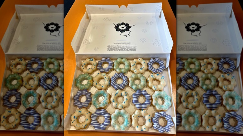 Open box showing 20 different mochi donuts from Mochi Joy