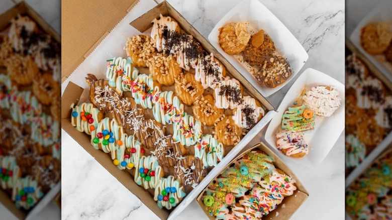 Boxes of various mini donuts from 6ix Donutz