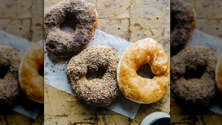 Three donuts from Hole Donuts togetehr on a table