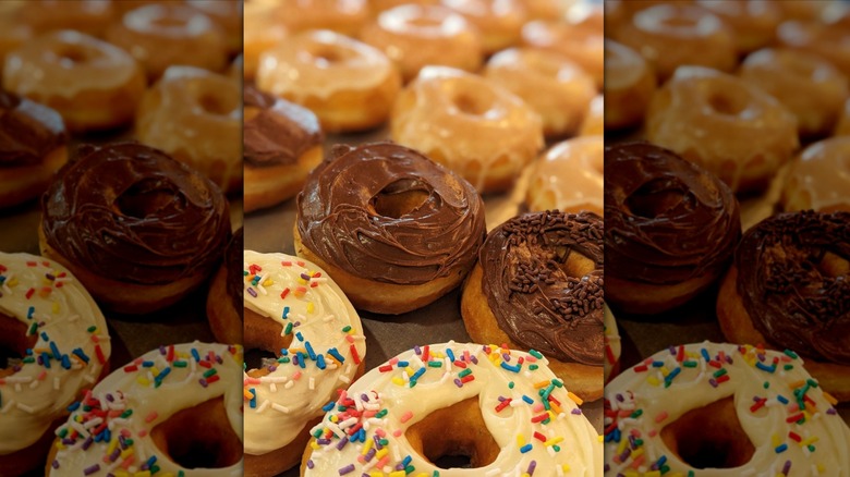 Display of frosted and glazed donuts from That Place in Leads