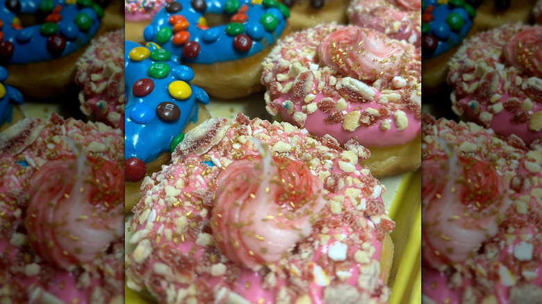 Variety of whimsical donuts on a tray from Robin's Snowflake Donuts and Cafe