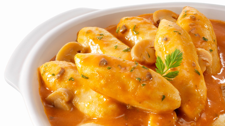 Quenelles de brochet in sauce Nantua