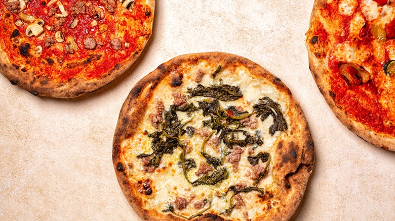 Different flavored pizza pies