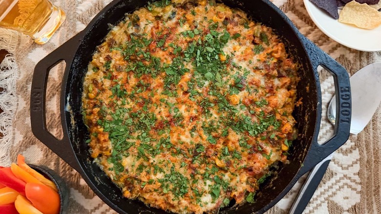 Best game day cheesy crab dip in cast iron skillet