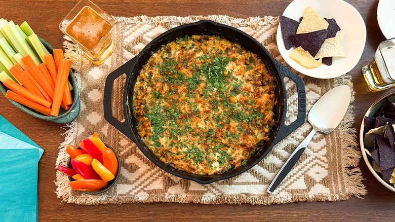 Best game day cheesy crab dip with veggies and tortilla chips