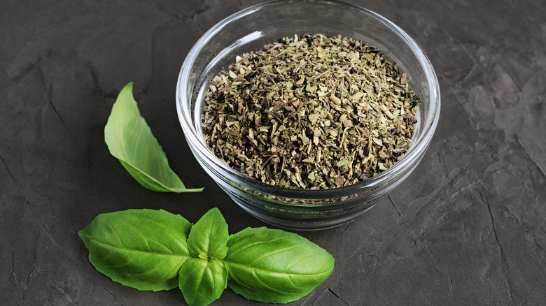 Dried basil and fresh leaves.