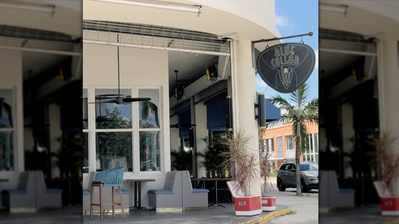 The exterior of Blue Collar with seating outside