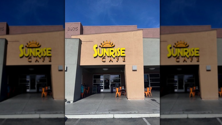 Exterior of Original Sunrise Cafe with blue sky behind it