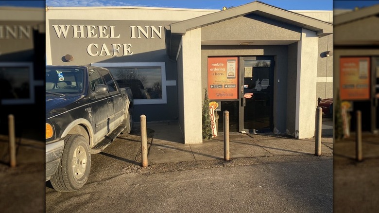 Exterior of Wheel Inn with a truck parked outside