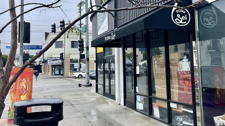 Side shot of the glass-fronted exterior at Pizzeria Sei