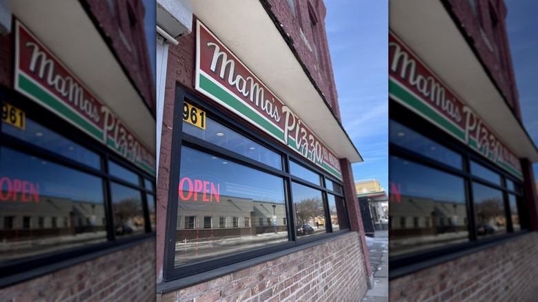 Exterior of Mama's Pizza with the red 'open' sign in the window