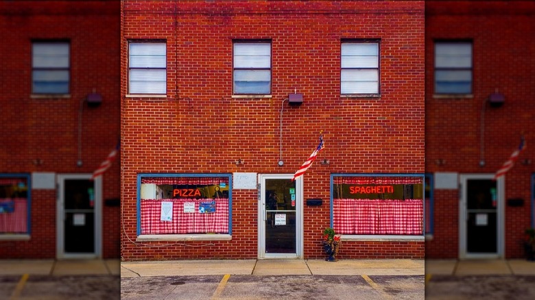 The red brick exterior of Rubino's Pizza