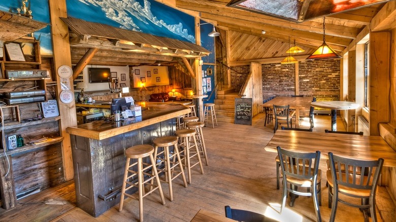 Interior of The Parker Pie Company with a wooden bar and wooden chairs and tables