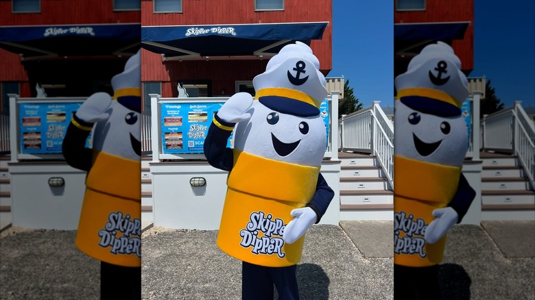 Skipper Dipper mascot standing outside the front of Skipper Dipper
