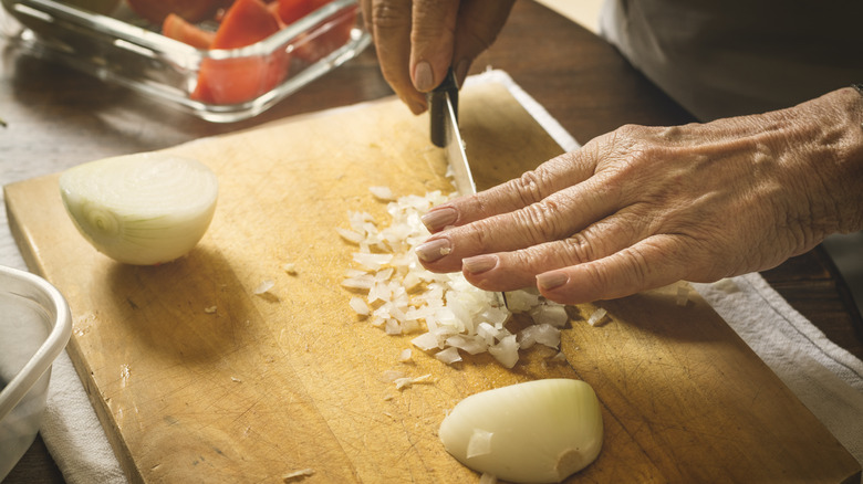 Chef dicing onions