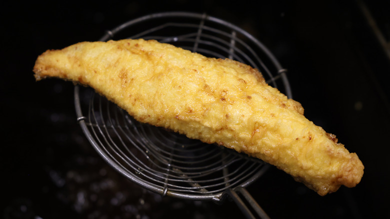 Fish and chip fished from oil