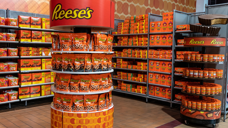 Many Reese's candies on display in a store.