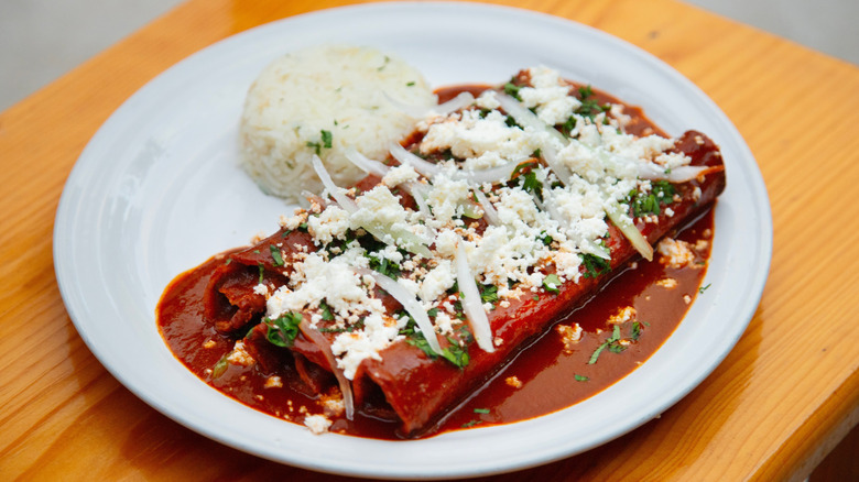 White plate of enchiladas